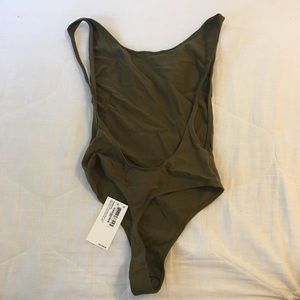 NWT deep cut bodysuit